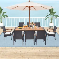 Costway 9 Pieces Patio Rattan Dining Set With Acacia Wood Table, 1.9" Umbrella Hole -Costway GUEST a74f300f fe76 41e7 a085 835542d7c82e