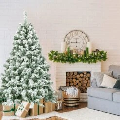 Costway 4.5FT Artificial Hinged Christmas Tree Snow Flocked Pine Tree W/400 Tips And Foldable Base -Costway GUEST de1832cd 7672 4589 88bb 70eb1412f4fb